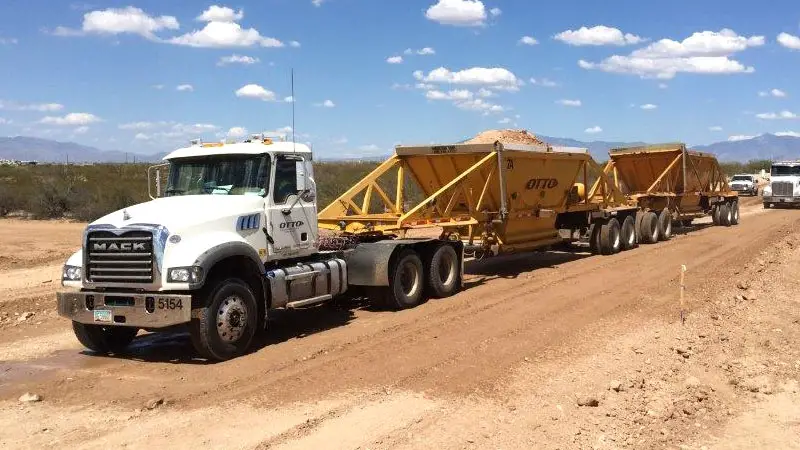 double-trailer-bottom-dump truck